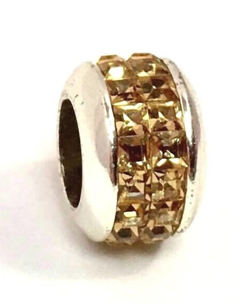 Front of a size O/S Spectrum Topaz Bead in Gold in Gold by Brighton. | dia_product_style_image_id:331522